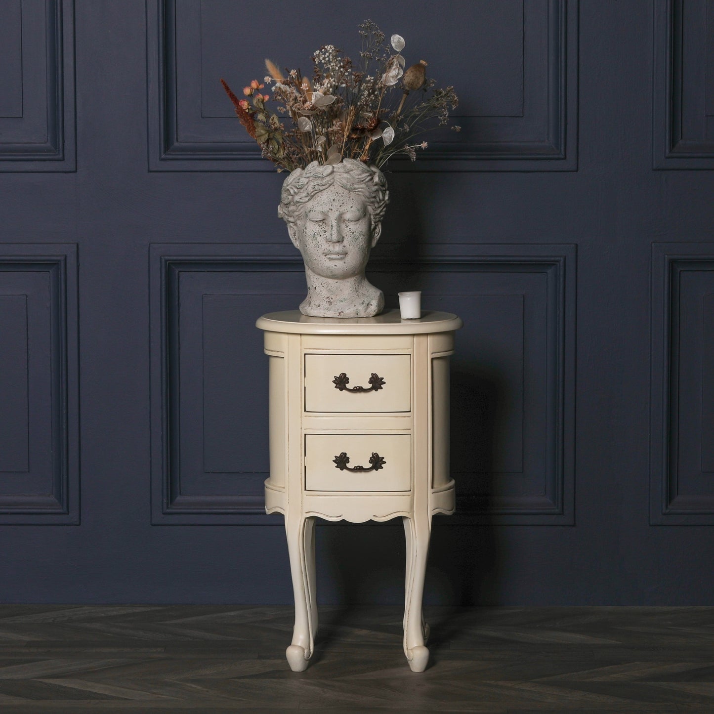 Aged ivory oval bedside Table