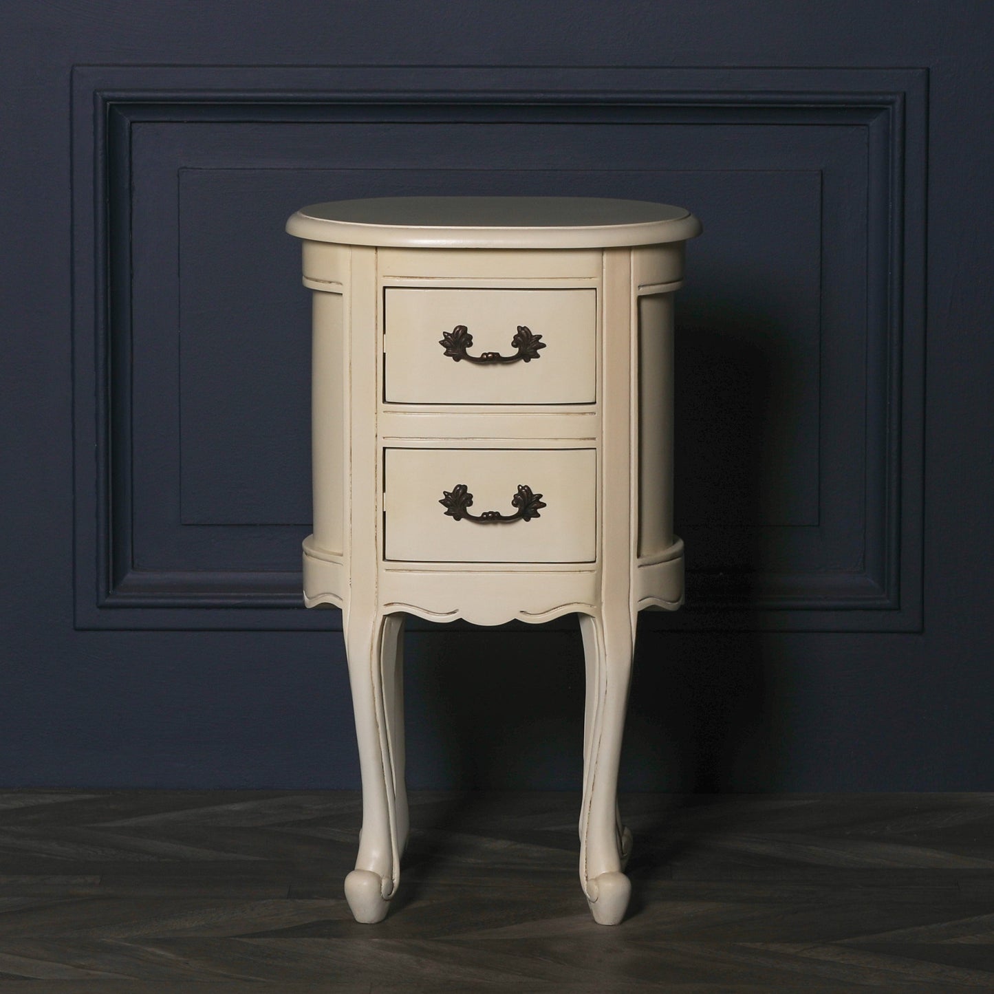 Aged ivory oval bedside Table
