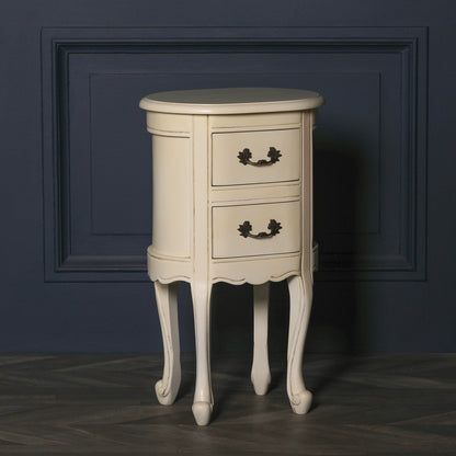 Aged ivory oval bedside Table