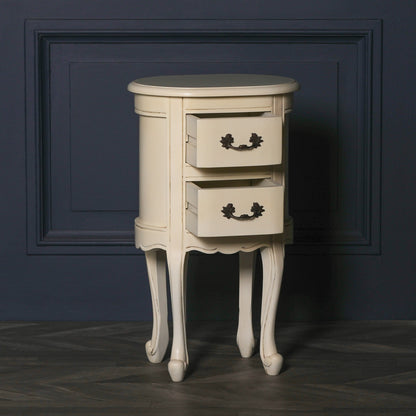 Aged ivory oval bedside Table